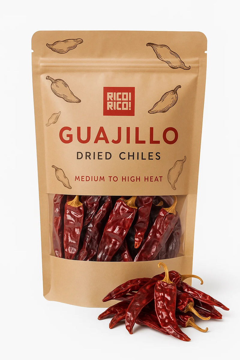 Rico Rico guajillo dried chiles in resealable bag with whole red chiles in front.